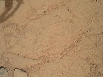 This set of images from NASA's Curiosity rover shows a patch of rock before and after it was cleaned by Curiosity's Dust Removal Tool (DRT).