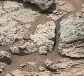 This image of an outcrop at the 'Sheepbed' locality, taken by NASA's Curiosity Mars rover shows well-defined veins filled with whitish minerals, interpreted as calcium sulfate.