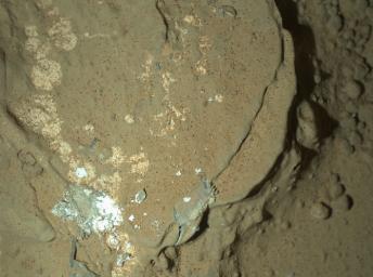 A Martian rock in the 'Yellowknife Bay' area of Mars' Gale Crater is illuminated by white-light light emitting diodes is part of the first set of nighttime images taken by the MAHLI camera at the end of the robotic arm of NASA's Mars rover Curiosity.
