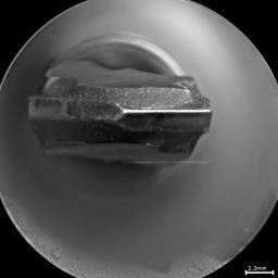 This head-on view shows the tip of the drill bit on NASA's Mars rover Curiosity. The view merges two exposures taken by the remote micro-imager in the rover's ChemCam instrument at different focus settings.