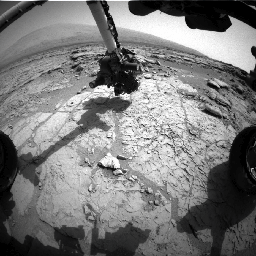 This frame from a set of three images from NASA's Curiosity rover shows the rover's drill in action on Feb. 8, 2013, or Sol 182, Curiosity's 182nd Martian day of operations.