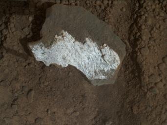 NASA's rover Curiosity took this close-up view of 'Tintina' showing interesting linear textures in the bright white material on the rock.