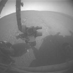 This image was taken by Opportunity's front hazard-avoidance camera after the Sol 3309 drive, looking back at the tracks produced while the rover was driving in reverse, as it often does.