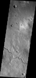 This image from NASA's Mars Odyssey spacecraft shows an unnamed channel located in Terra Sabaea, near Hellas Planitia.