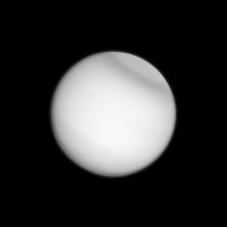 Titan's polar collar, previously seen by NASA's Voyager 2 and the Hubble Space Telescope, has now been observed by NASA's Cassini spacecraft, seen here in ultraviolet light. The collar is believed to be seasonal in nature. 