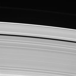 Saturn's moon Pan, named for the Greek god of shepherds, rules over quite a different domain: the Encke gap in Saturn's rings. This image is from NASA's Cassini spacecraft.