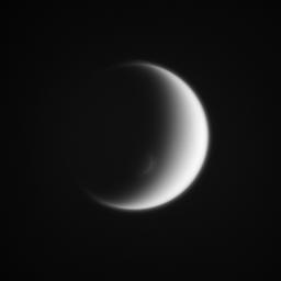 This view captured by NASA's Cassini spacecraft looks toward the trailing hemisphere of Titan. Titan's south polar vortex mimics the moon itself, creating an elegant crescent within a crescent.