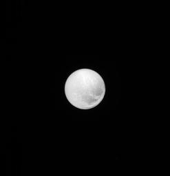 As seen by NASA's Cassini spacecraft, the surface of Dione is covered in craters, reminding us of the impacts that have shaped all of the worlds of our solar system; the surface also bears linear features that suggest geological activity in the past.
