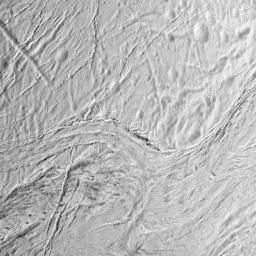 During its final close flyby of Saturn's moon Enceladus, NASA's Cassini orbiter shows this view featuring the nearly parallel furrows and ridges of the feature named Samarkand Sulci.