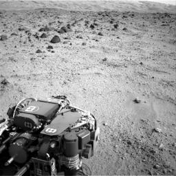 Lower slopes of Mount Sharp appear at the top of this image taken by the right Navigation Camera (Navcam) of NASA's Mars rover Curiosity at the end of a drive of about 135 feet during the 329th Martian day, or sol, of the rover's work on Mars.