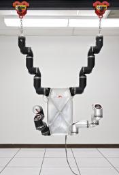This photograph shows RoboSimian, a disaster-relief and -mitigation robot, under construction in a lab at NASA's Jet Propulsion Laboratory, Pasadena, Calif.