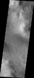 This image from NASA's Mars Odyssey spacecraft shows what looks like a smiley face on the surface of Mars.