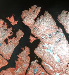 This image from NASA's Terra spacecraft shows the town of Kirkenes in northernmost Norway, with its 3400 inhabitants, as they prepare for an expected boom as a shipping hub, as global warming has led to the opening up of the Northern Sea Route.
