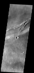 This image from NASA's 2001 Mars Odyssey spacecraft shows part of the summit caldera on Arsia Mons.