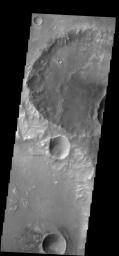 Dunes on Mars can be seen in the bottom and upper right central parts this image of Terra Cimmeria captured by NASA's 2001 Mars Odyssey spacecraft.
