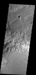 This image shows one of the two landslide deposits within this unnamed crater north of Ares Vallis as seen by NASA's 2001 Mars Odyssey spacecraft.