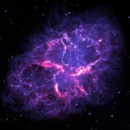 This image shows a composite view of the Crab nebula, an iconic supernova remnant in our Milky Way galaxy, as viewed by the Herschel Space Observatory and the Hubble Space Telescope.