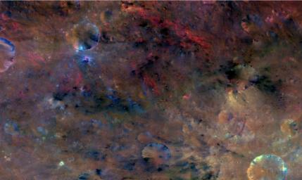 This colorized composite image from NASA's Dawn mission shows the crater Antonia, which lies in the enormous Rheasilvia basin in the southern hemisphere of the giant asteroid Vesta.