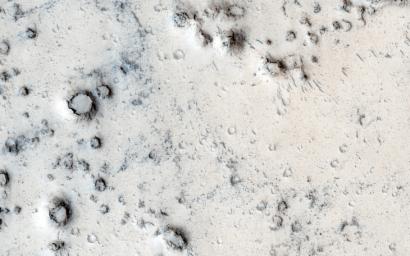 Many types of craters exist on Mars. Most are generated by impacts of asteroids and comets. However, in this image captured by NASA's Mars Reconnaissance Orbiter, the craters may be due to steam explosions.