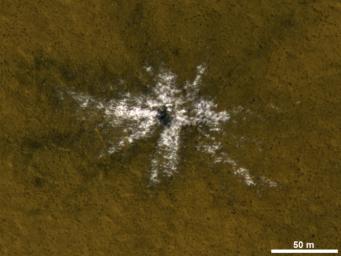This image taken by NASA's Mars Reconnaissance Orbite on May 19, 2010, shows an impact crater that had not existed when the same location on Mars was previously observed in March 2008.