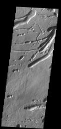 This image shows a different portion of the collapse features located on the northern flank of Ascraeus Mons as seen by NASA's 2001 Mars Odyssey spacecraft.