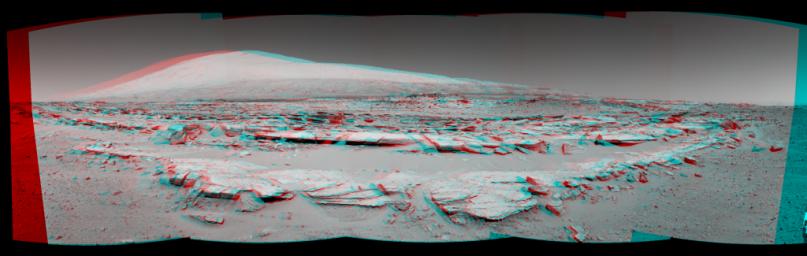 A stereo landscape scene from NASA's Curiosity Mars rover shows rock rows at 'Junda' forming striations in the foreground, with Mount Sharp on the horizon. You need 3D glasses to view this image.