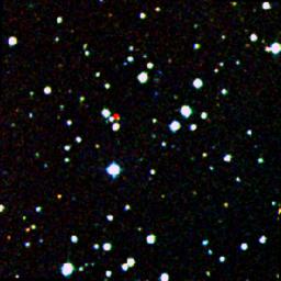 A nearby star, called WISEA J204027.30+695924, stands out in red in this image from the Second Generation Digitized Sky Survey.