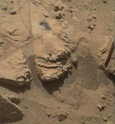 This May 12, 2014, view from NASA's Curiosity Mars Rover shows the rock target 'Windjana' and its immediate surroundings after inspection of the site by the rover by drilling and other activities.