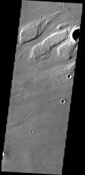 This image from NASA's 2001 Mars Odyssey spacecraft shows streamlined islands within part of Kasei Valles.