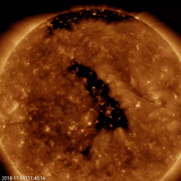 NASA's Solar Dynamics Observatory shows a good-sized coronal hole at a slanted angle nearly centered on the face of the sun (Oct. 31 - Nov. 2, 2018).