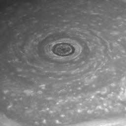 Like a giant eye for the giant planet, Saturn's great vortex at its north pole appears to stare back at Cassini as NASA's Cassini spacecraft stares at it.