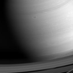 Saturn's surface is painted with swirls and shadows. Each swirl here is a weather system, reminding us of how dynamic Saturn's atmosphere is. This image is from NASA's Cassini spacecraft.
