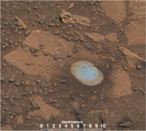 A swept Martian rock called 'Bonanza King' can be seen in this image take by NASA's Mars Curiosity rover. This rock is located across the boundary that defines the base of Mount Sharp.