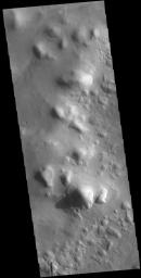 The hills in this image captured by NASA's 2001 Mars Odyssey spacecraft are part of Protonilus Mensae, located on the northern margin of Terra Sabaea.