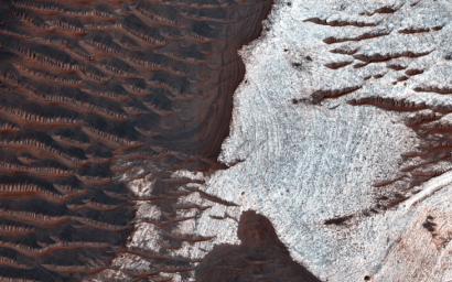 Many of the depressions in Noctis Labyrinthus contain water-bearing minerals, suggesting that water was available and persistent in this region during the Late Hesperian to Amazonian epochs on Mars, as seen by NASA's Mars Reconnaissance Orbiter.