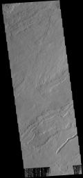 This image from NASA's 2001 Mars Odyssey spacecraft shows lava flows near Arsia Mons.