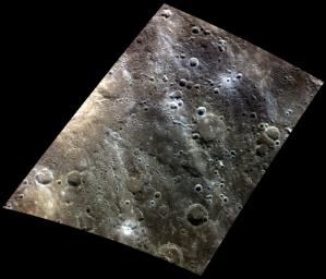 Crossing Paths. At the left edge of this color view is a relatively fresh crater as seen by NASA's MESSENGER spacecraft.
