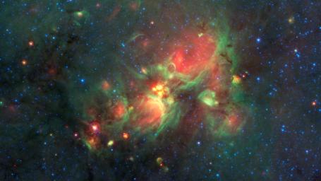 'Yellow balls' -- which are several hundred to thousands times the size of our solar system -- are pictured here in the center of this image taken by NASA's Spitzer Space Telescope.
