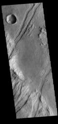 The linear graben in this image from NASA's 2001 Mars Odyssey spacecraft are part of Claritas Fossae.