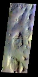 The THEMIS VIS camera contains 5 filters. The data from different filters can be combined in multiple ways to create a false color image. This false color image from NASA's 2001 Mars Odyssey spacecraft shows part of of Eos Chasma.
