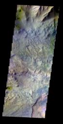 The THEMIS VIS camera contains 5 filters. The data from different filters can be combined in multiple ways to create a false color image. This false color image from NASA's 2001 Mars Odyssey spacecraft shows part of Candor Labes.