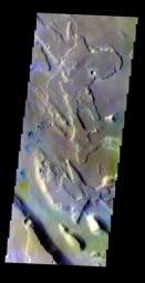 The THEMIS VIS camera contains 5 filters. The data from different filters can be combined in multiple ways to create a false color image. This false color image from NASA's 2001 Mars Odyssey spacecraft shows part of of Ares Vallis.