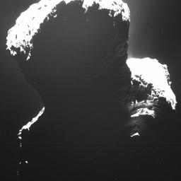 This is a rare glance at the dark side of comet 67P/Churyumov-Gerasimenko. Light backscattered from dust particles in the comet's coma reveals a hint of surface structures. This image was taken by OSIRIS, Rosetta's scientific imaging system.