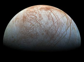 The puzzling, fascinating surface of Jupiter's icy moon Europa looms large in this newly-reprocessed color view, made from images taken by NASA's Galileo spacecraft in the late 1990s.