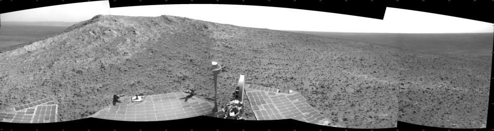 NASA's Mars Exploration Rover Opportunity recorded this view of the summit of 'Cape Tribulation,' on the western rim of Endeavour Crater on the day before the rover drove to the top.