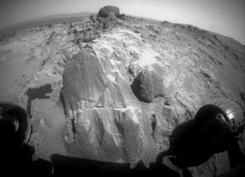 The flat-faced rock near the center of this image is a target for contact investigation by NASA's Mars Exploration Rover Opportunity in early March 2015. The rock includes a target called 'Sergeant Charles Floyd.'