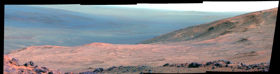 This false color view from NASA's Mars Exploration Rover Opportunity shows part of 'Marathon Valley,' a destination on the western rim of Endeavour Crater, as seen from an overlook north of the valley.
