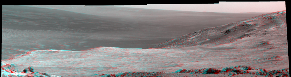 This 3-D stereo scene from NASA's Mars Exploration Rover Opportunity shows part of 'Marathon Valley,' a destination on the western rim of Endeavour Crater, as seen from an overlook north of the valley.