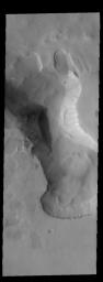 This image from NASA's 2001 Mars Odyssey spacecraft shows a wedge shaped field of dunes located in an unusual depression on the floor of this unnamed crater in Noachis Terra.