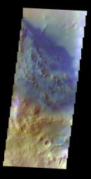The THEMIS VIS camera contains 5 filters. The data from different filters can be combined in multiple ways to create a false color image. This false color image from NASA's 2001 Mars Odyssey spacecraft shows dunes on the floor of Pettit Crater.